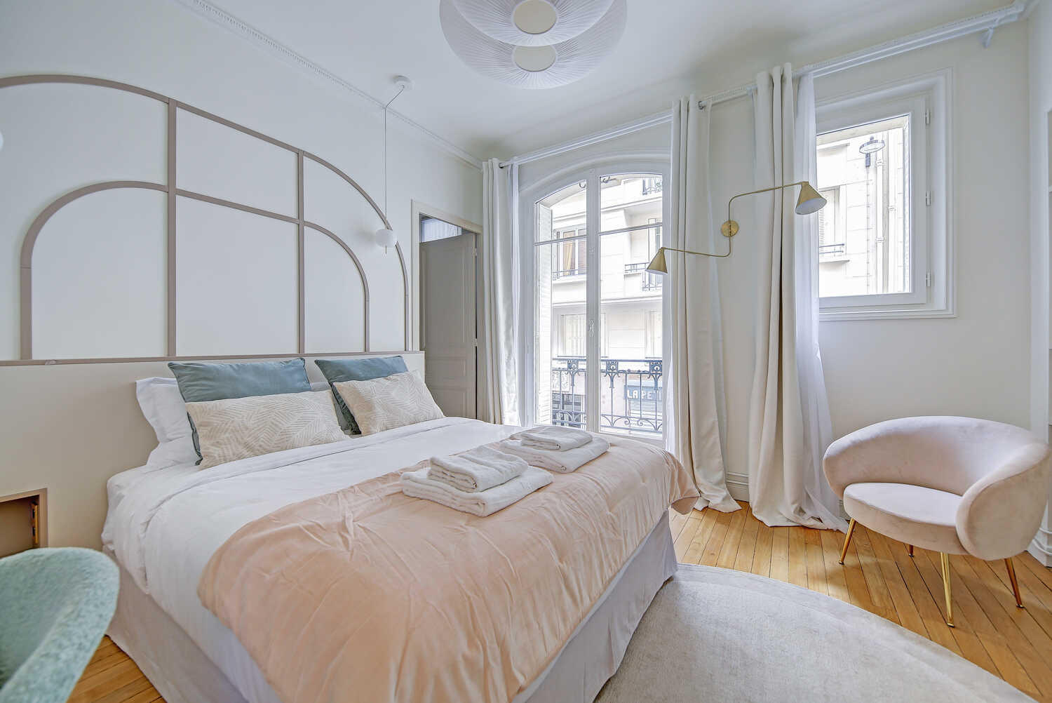Bedroom with architectural lighting fixtures