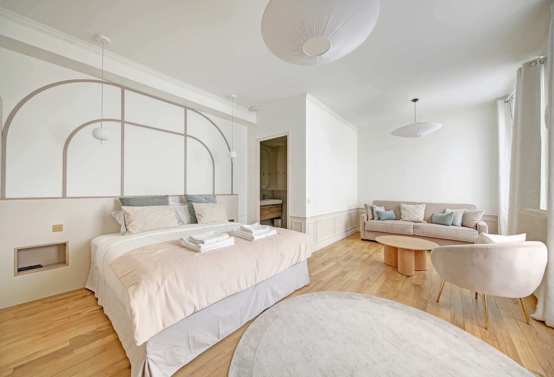 Spacious family room with comfortable seating and elegant decor