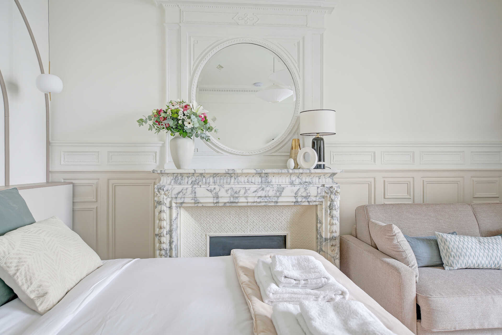 Luxurious bedroom with marble fireplace